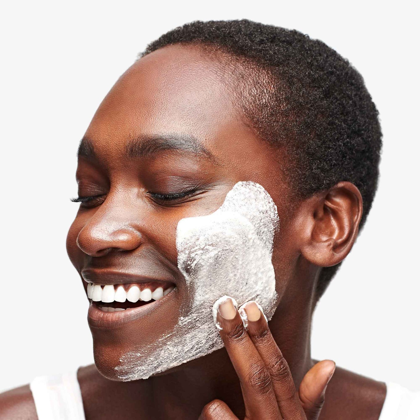 Daily Microfoliant being applied to face