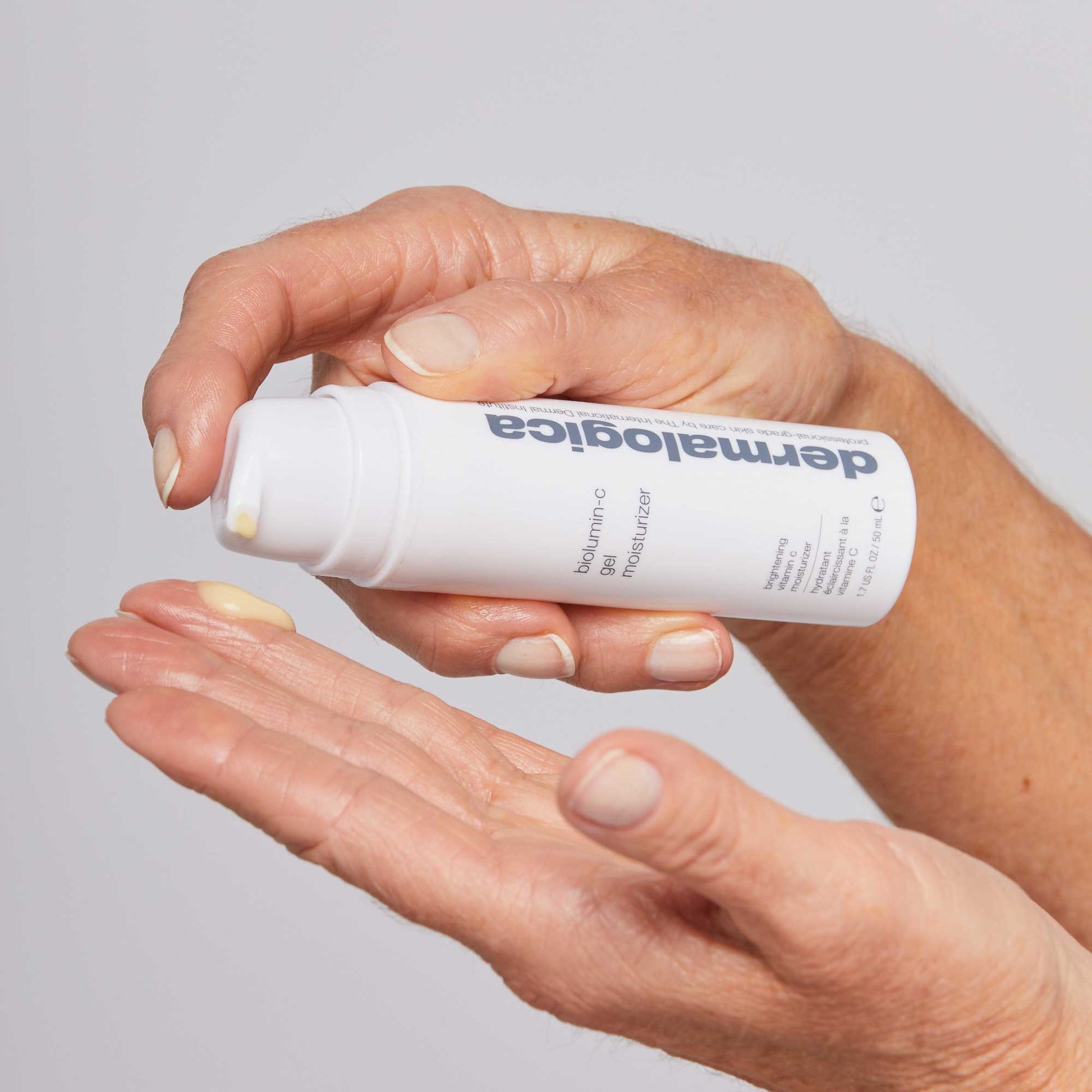 Biolumin-C Vitamin C Gel Moisturiser poured into hands